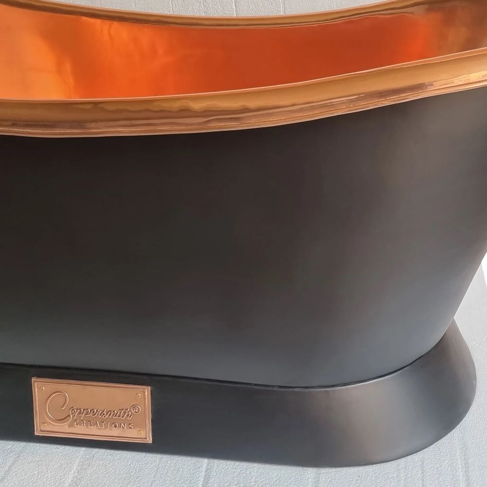 Coppersmith Creations Slanting Base Copper Bathtub Full Black Exterior with close up of side paint