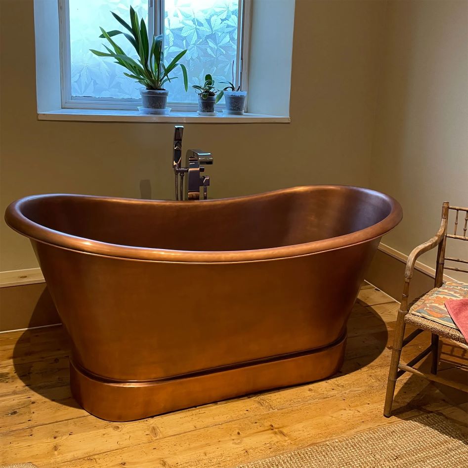 Coppersmith Creations Smooth Double Slipper Copper Bathtub installed in customer bathroom