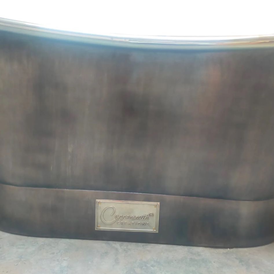 Coppersmith Creations Straight Base Copper Bathtub Nickel Interior Finish & Patinated Lead Finish Exterior close up of side